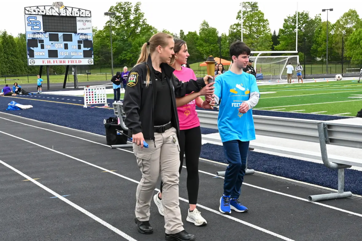 Taking Up the Torch at Special Olympics Feet Meet